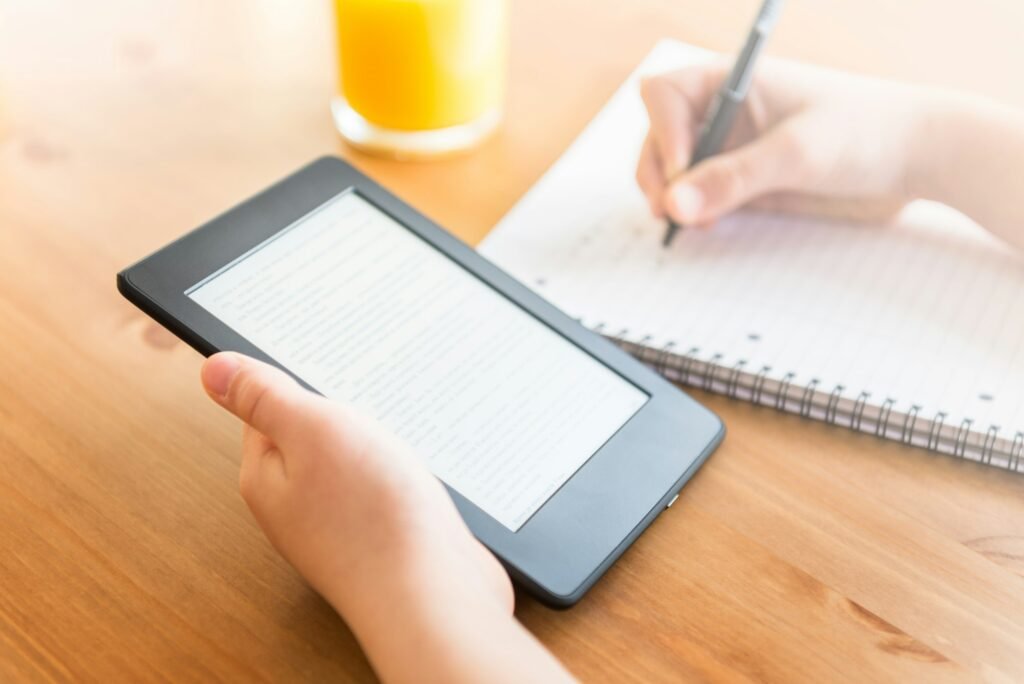 Girl is reading ebook on digital tablet device